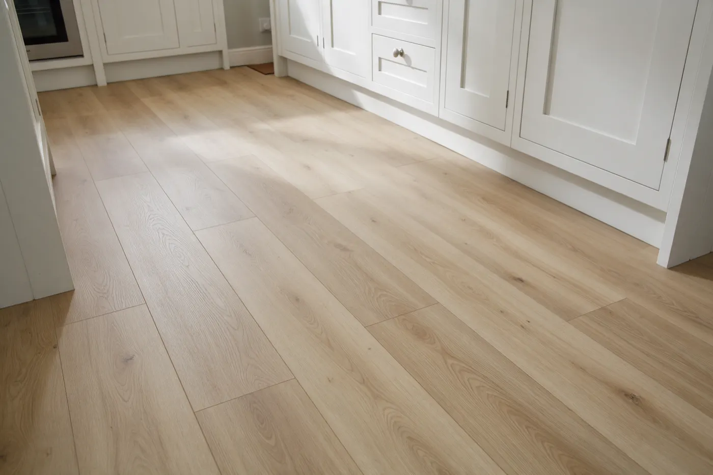 Wood-effect luxury vinyl planks in a kitchen